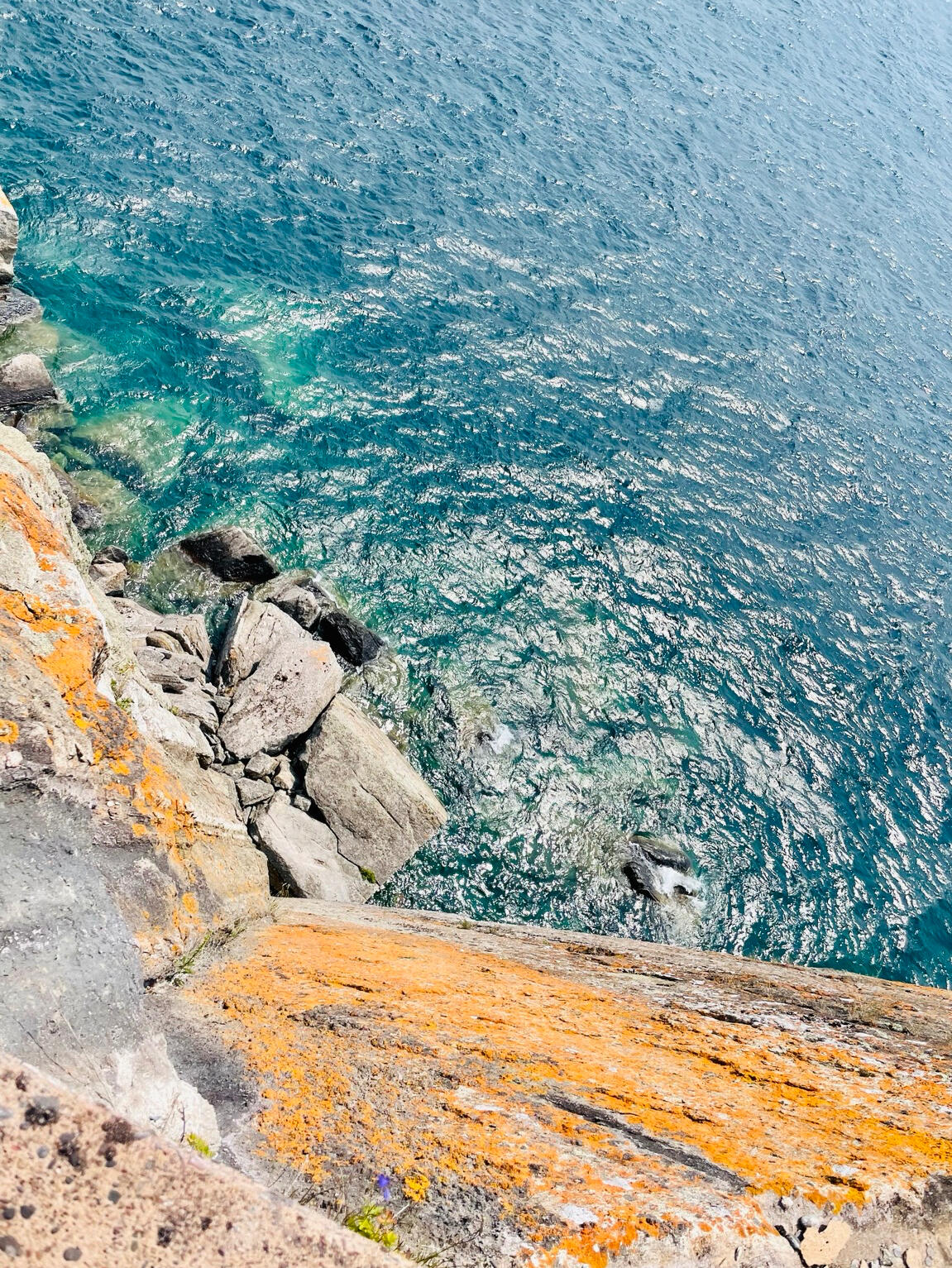 Cliff with turquoise water Cliff with turquoise water